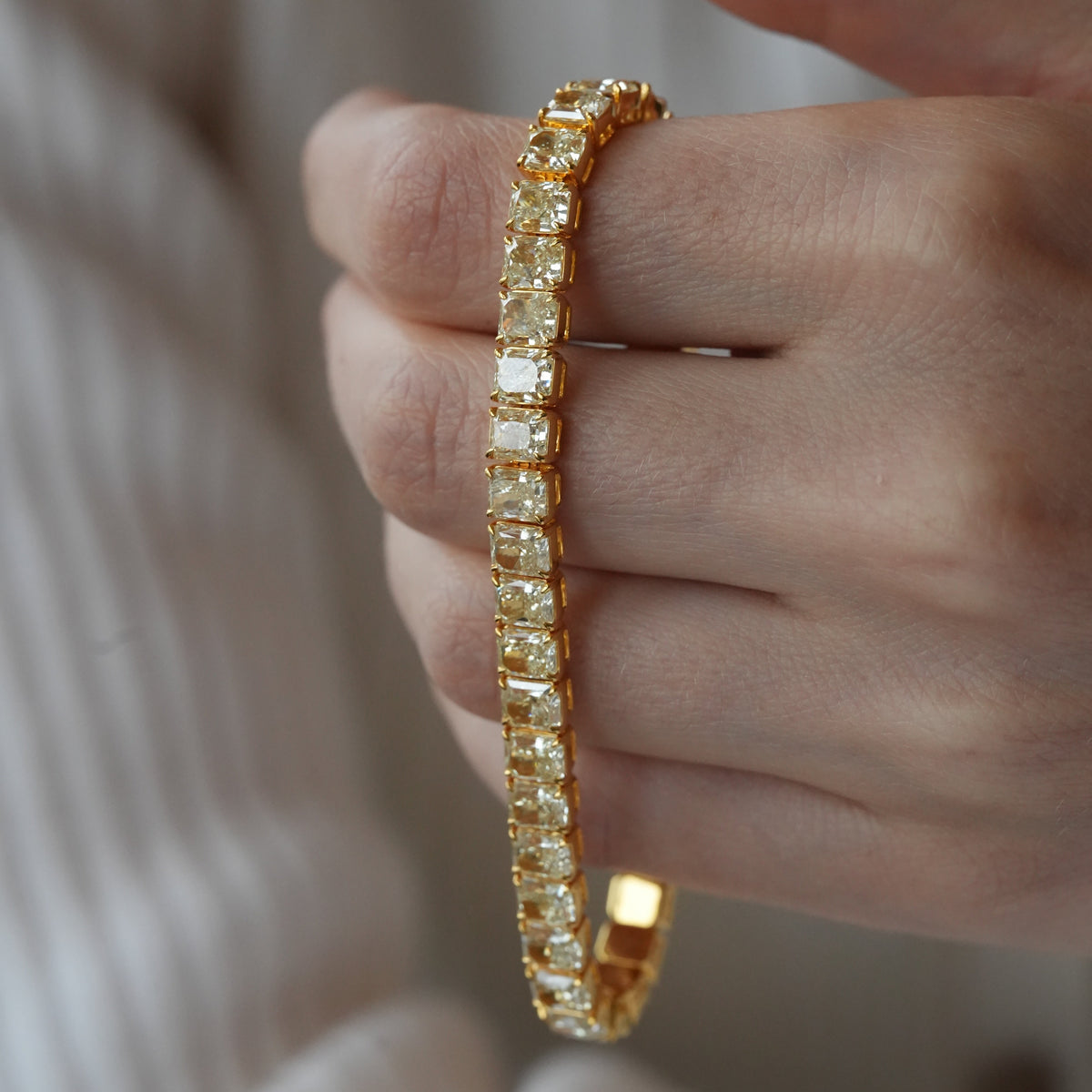 FANCY RADIANT TENNIS BRACELET 14.08 tcw